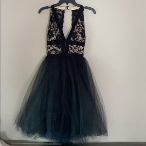 Lace top fit and flare black dress